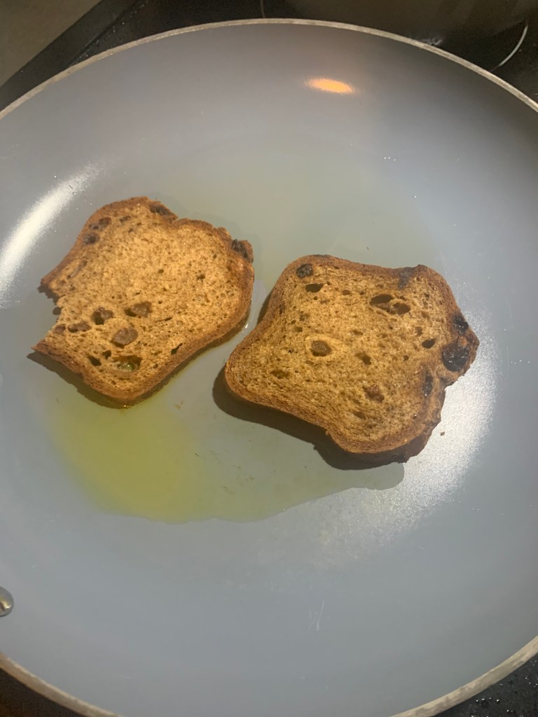 Base Culture bread cooking in a pan on the stove with some ghee