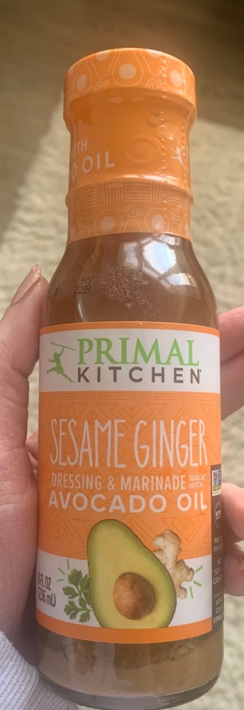 Orange bottle of Primal Kitchen Sesame Ginger Stir Fry Sauce